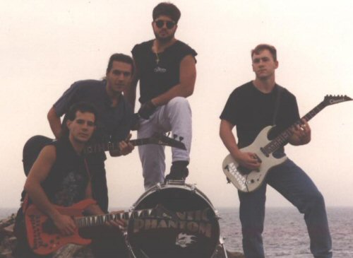 Atlantic Phantom 1994 is the promo picture for the group. From left to right are Michael Firicano (lead guitar and vocals), Joseph Ipolitto (lead vocals and bass), Mark Desimone (percussion and backing vocals), and Brian Fligor (rhythm guitar and backing vocals).