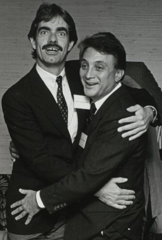 Jerry Northern (left) expresses his thanks to Chuck Berlin (right) for writing the lyrics to Acronym Jim